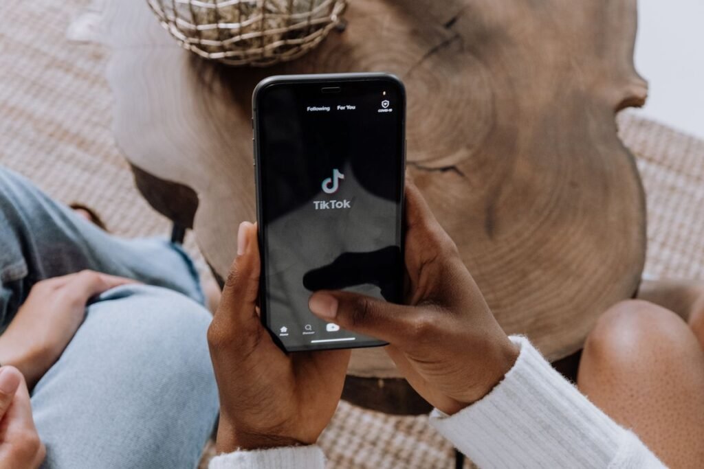 Smartphone syncing data to the cloud on a table